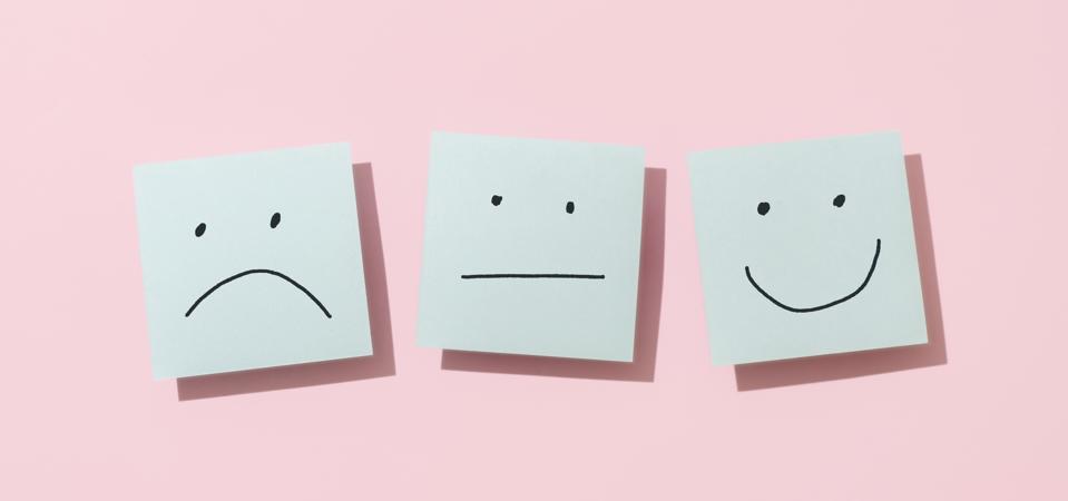 Three Blue Sticky Blank Notes On Pink Background
