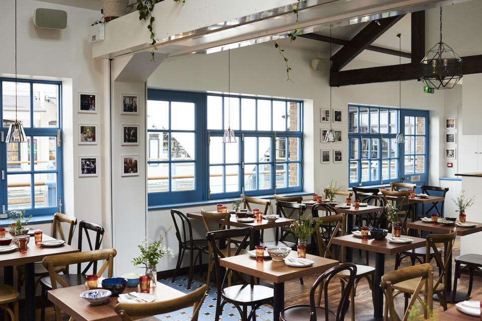 dining room with blue windows