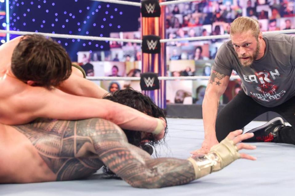 Edge serves as Special Enforcer to match between Daniel Bryan and Roman Reigns.