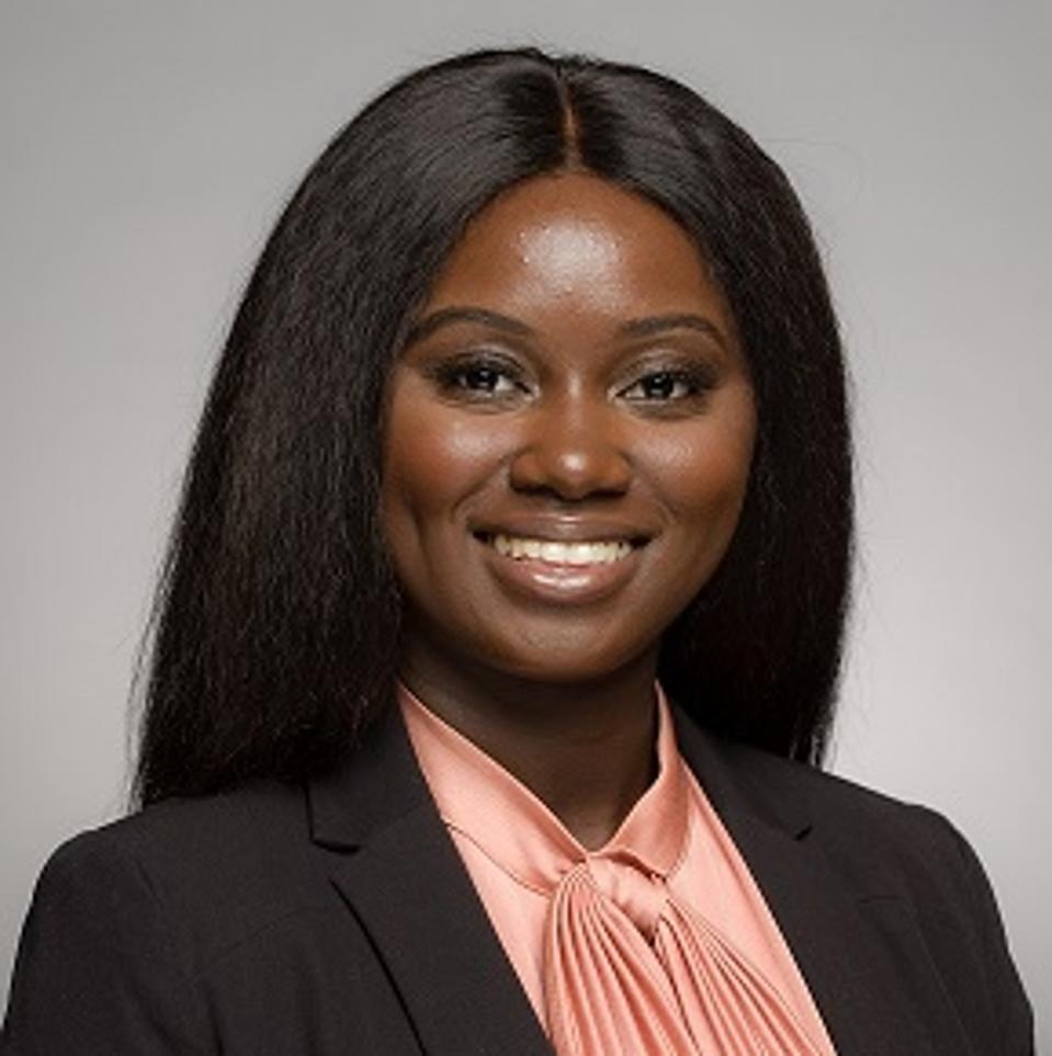 Headshot of Ayomide Adeleye smiling.