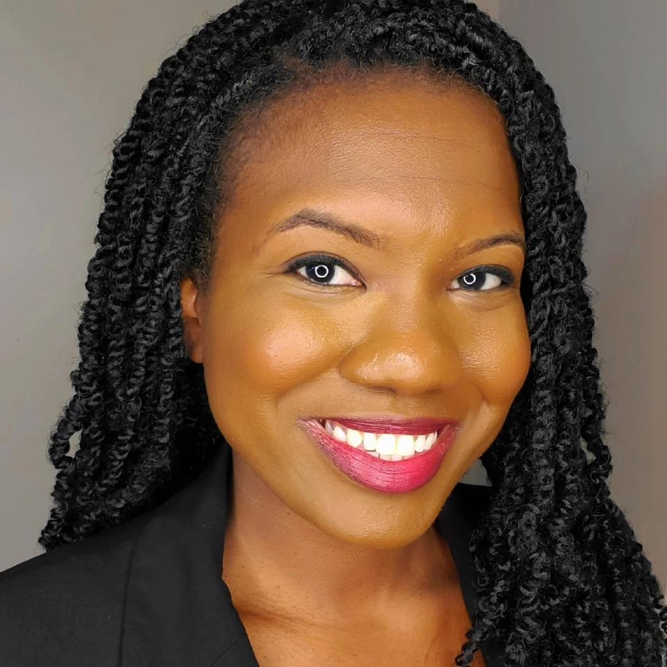 Headshot of Danielle Ward smiling.