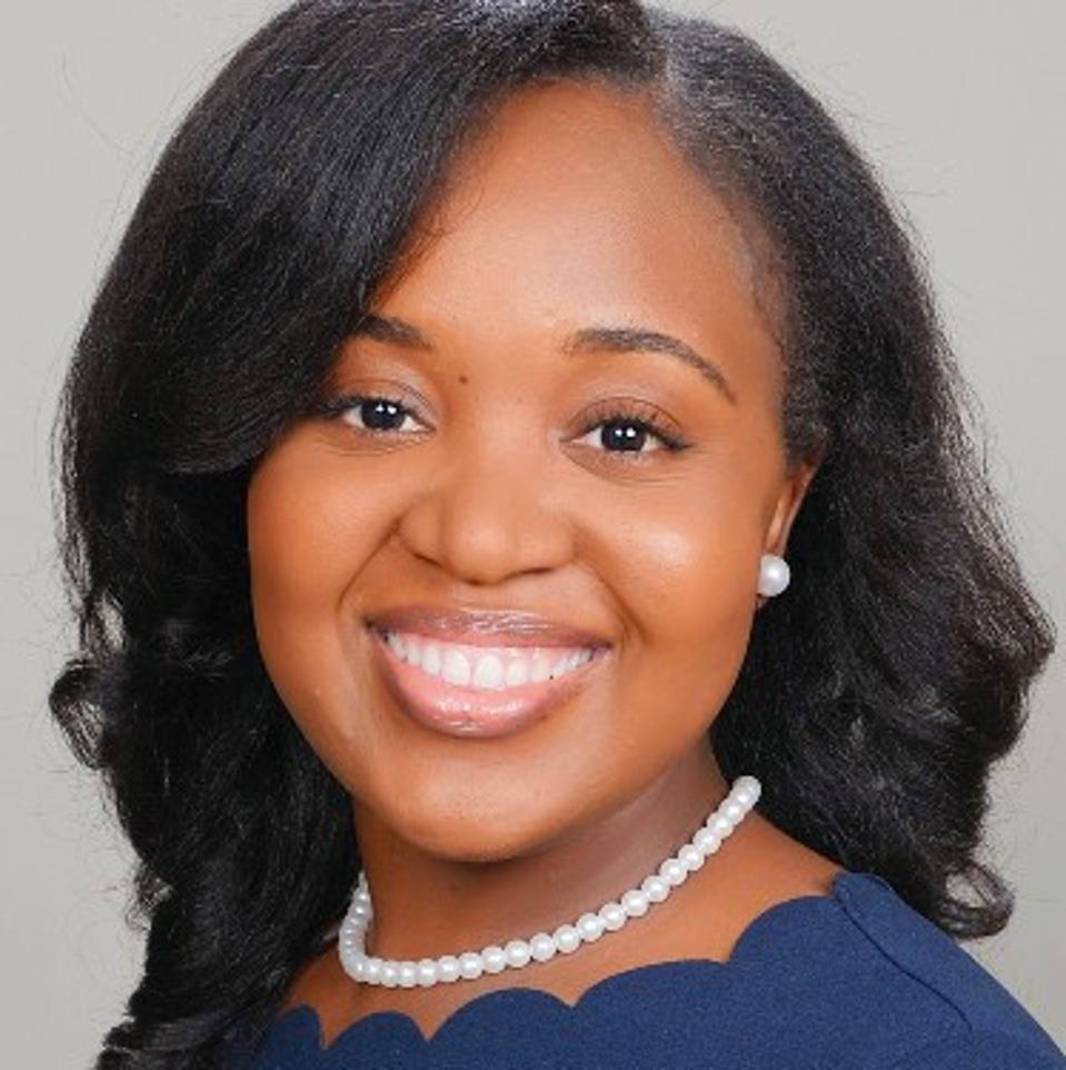 Headshot of Cherna Cherfrere smiling.