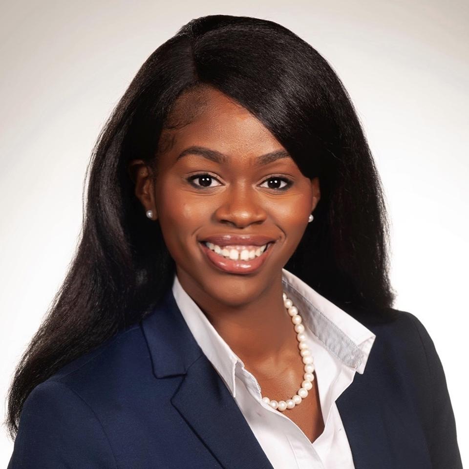 Headshot of Janet Nwaukoni smiling.