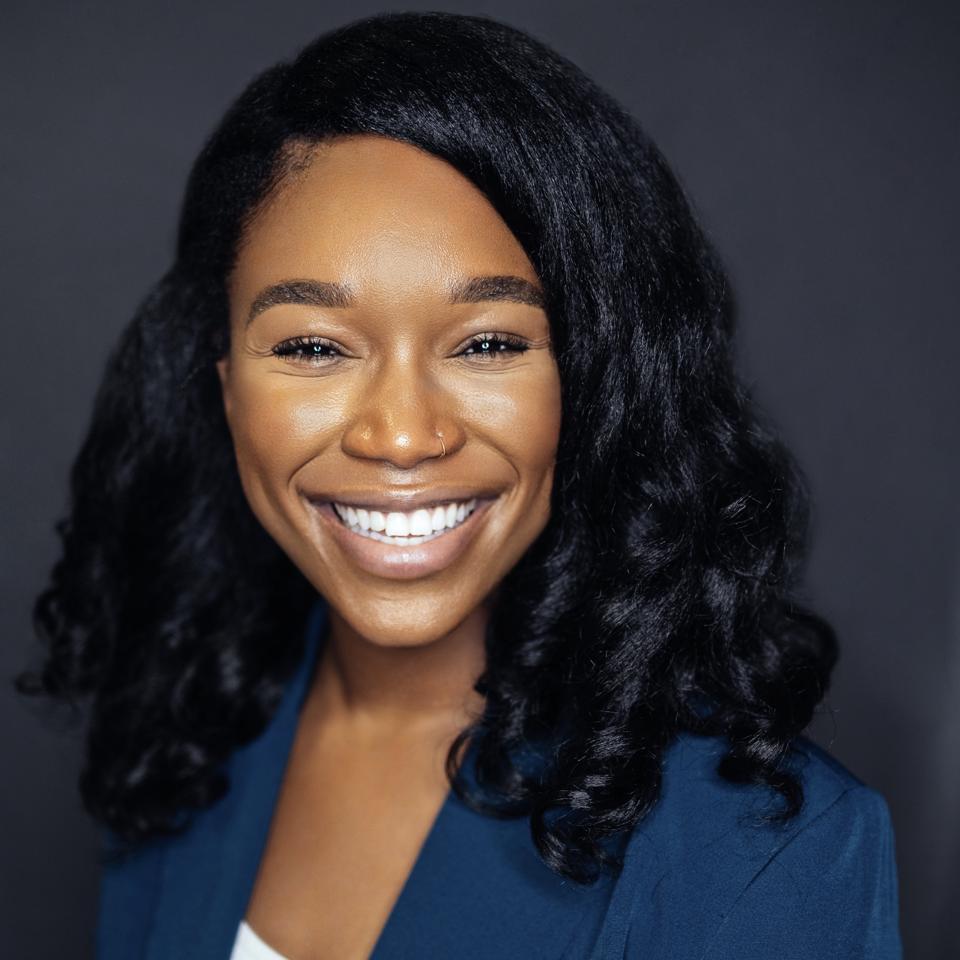 Headshot of Osose Oboh smiling.