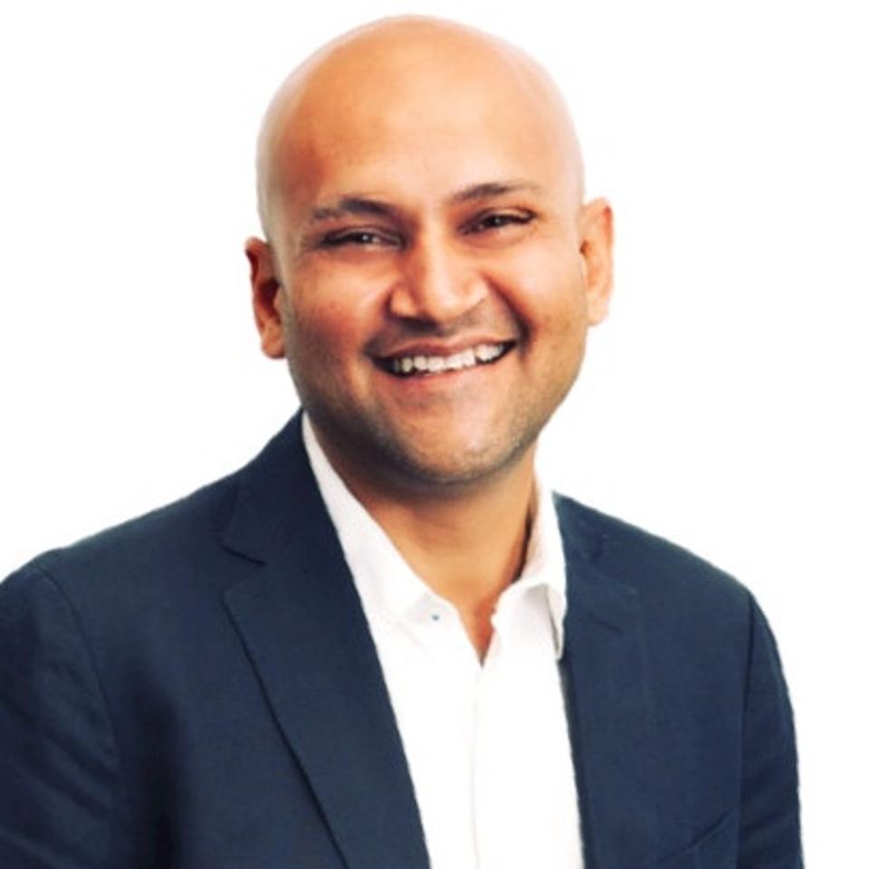 Dole CMO Rupen Desai smiles as he poses for a photograph.