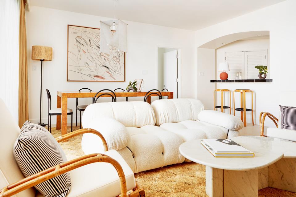 All suites are individually furnished with artwork and minimalist furnishings.