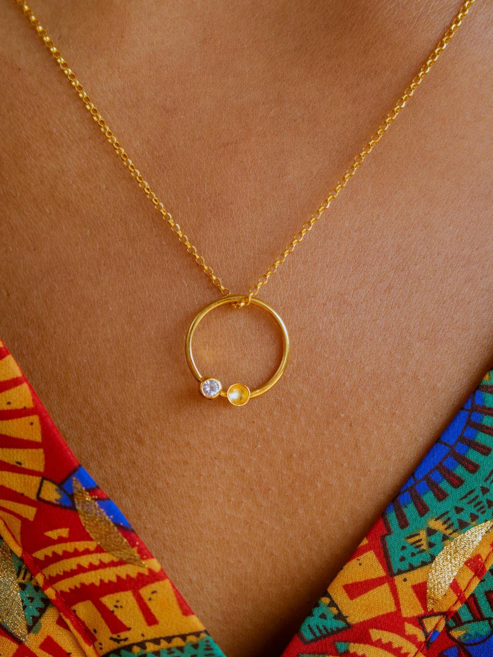 The Night Sky necklace by Kassandra Lauren Gordon, 22ct gold vermeil with white diamond cut sapphire stone