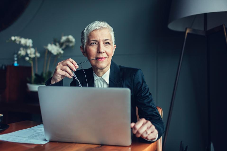 Mature Businesswoman In Her Office.