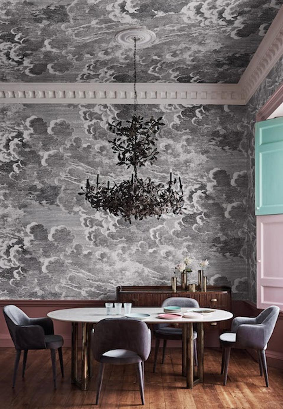 A room with wallpaper on the ceiling