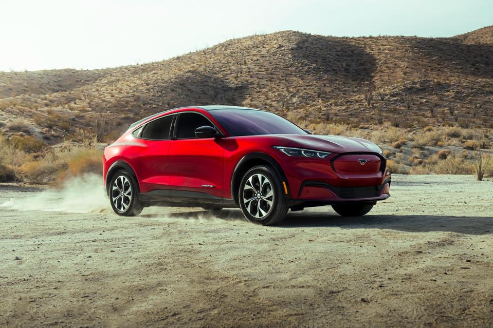 Mustang Mach E Stalks Tesla As Ford Strains To Meet Hot Demand Ford Car Christmas Ads 2021