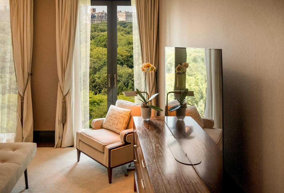 Sumptuous fabrics and beautiful custom furniture are found in the duplex residences.
