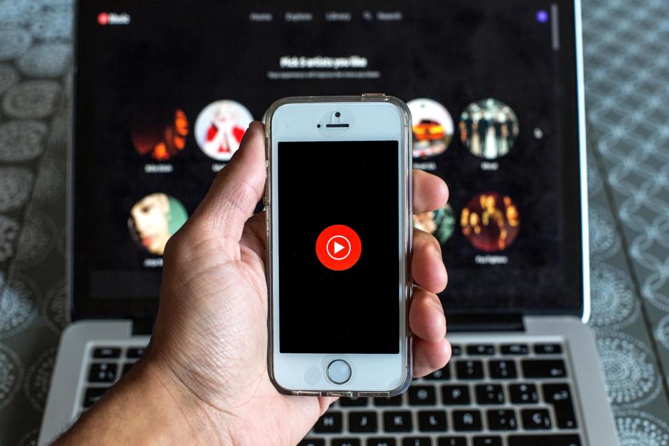 In this photo illustration the YouTube Music app seen...