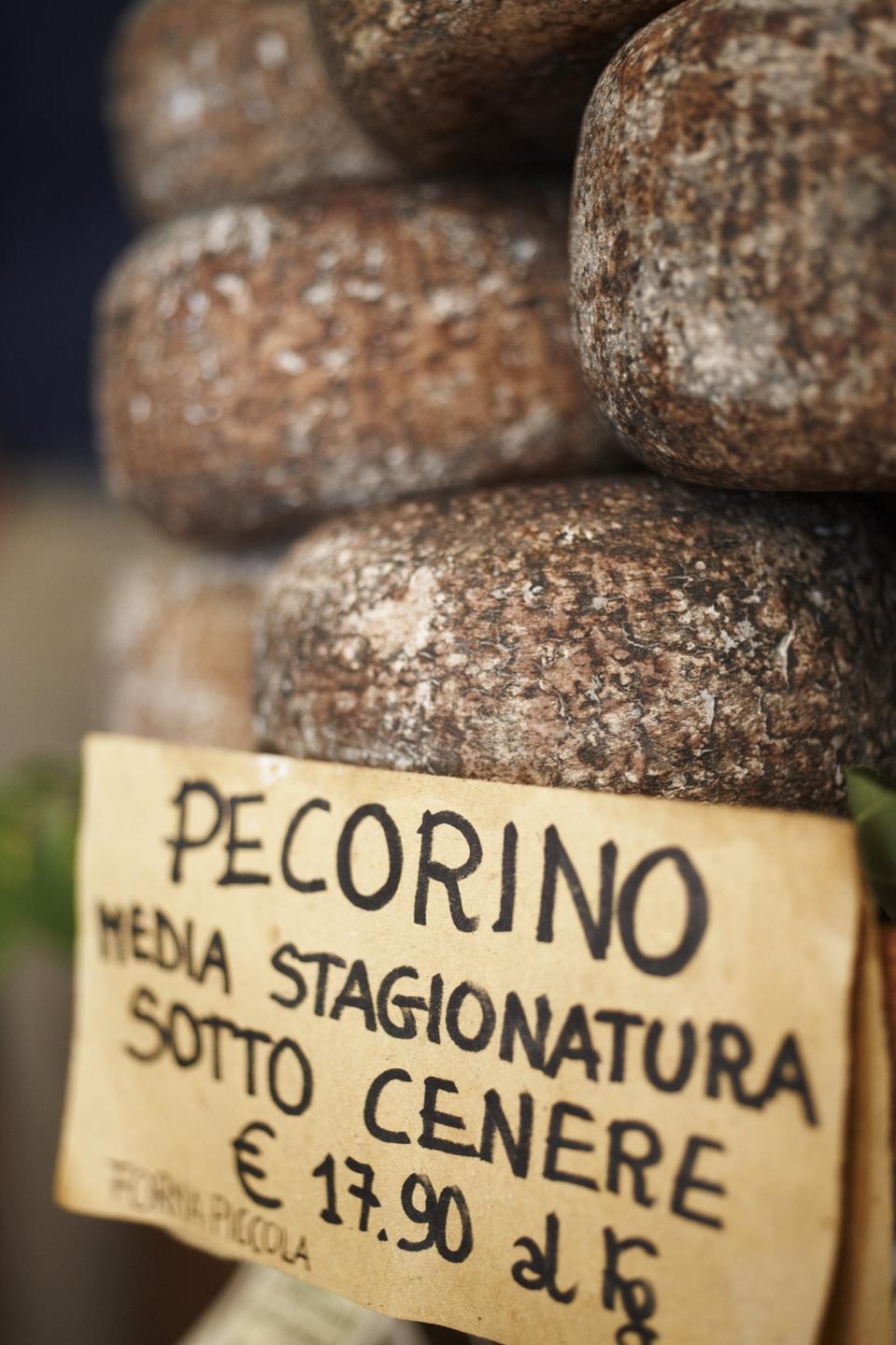 Display of Pecorino Cheese in a shop