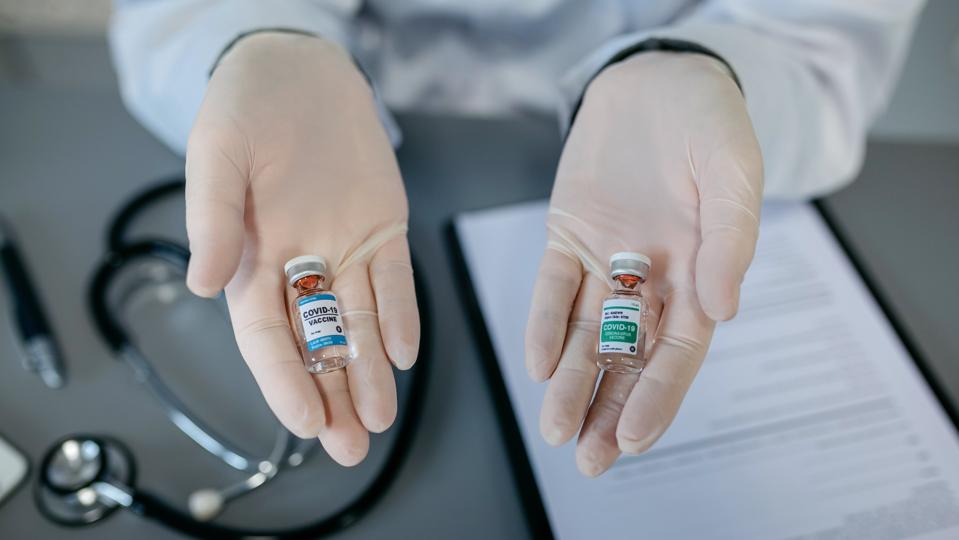 Cropped Hands Of Doctor Holding Medicines