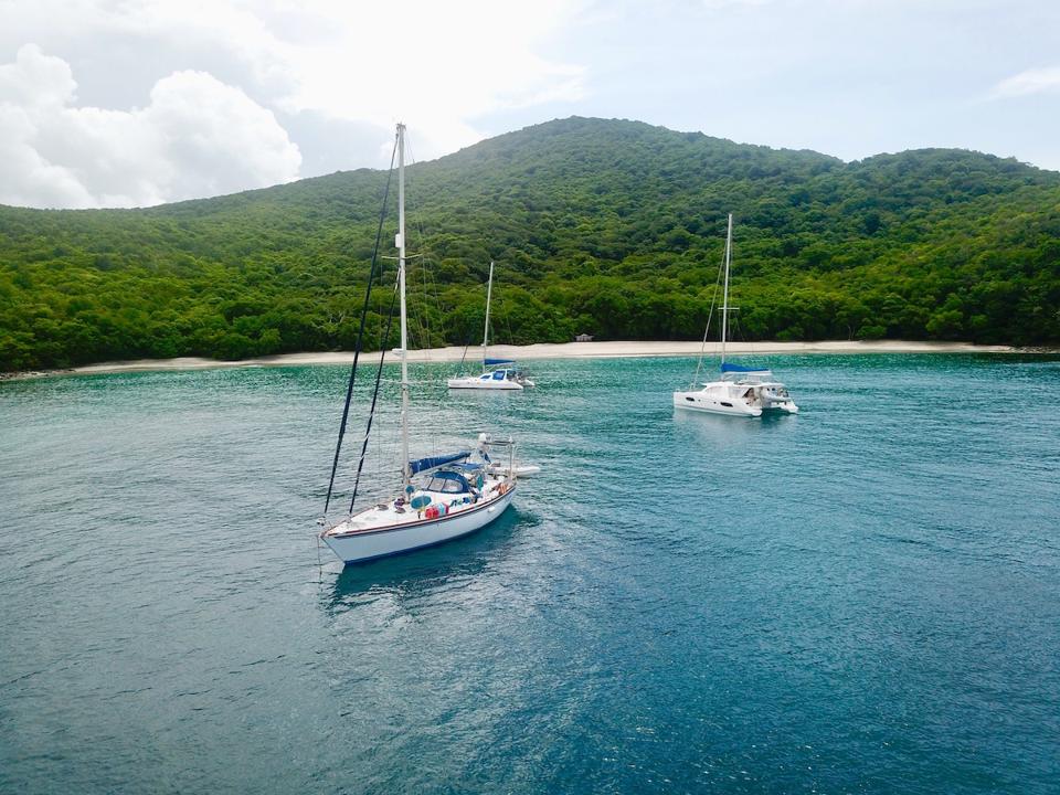 yacht sailboat anchorage tropical harbor