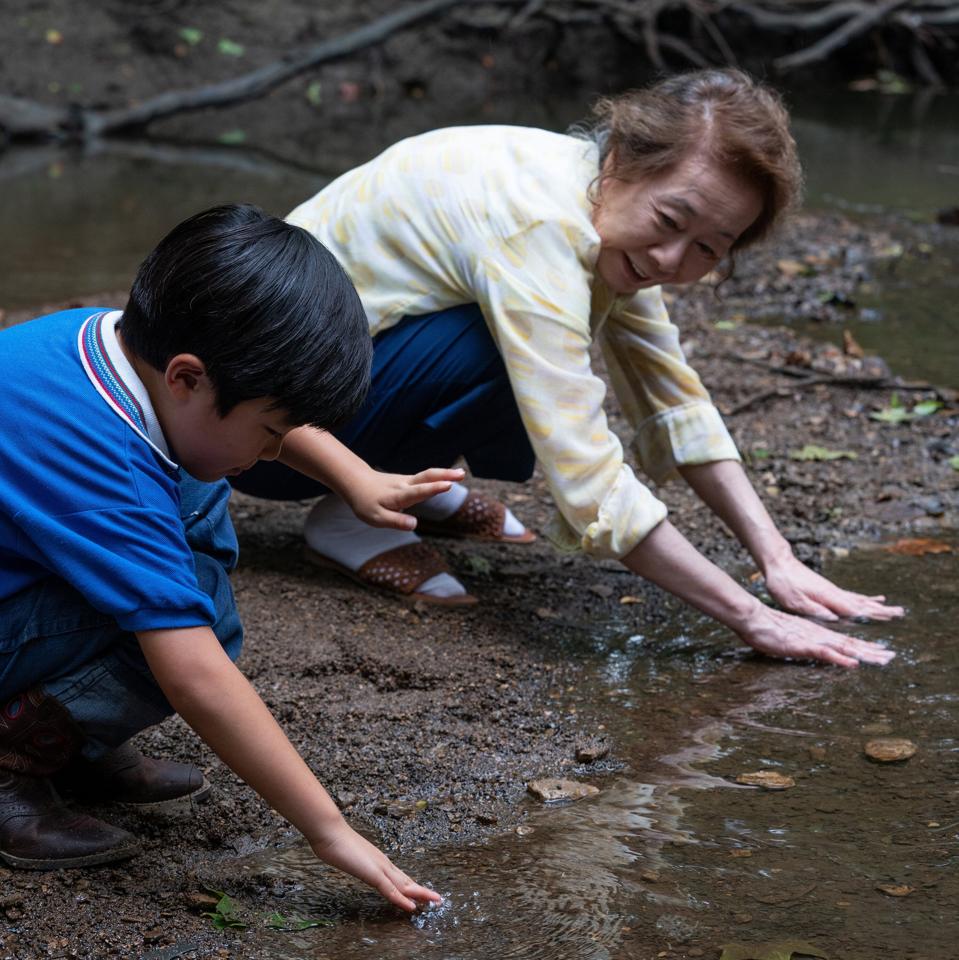 Actors Alan S. Kim and Yuh-Jung Youn in a scene from the film Minari