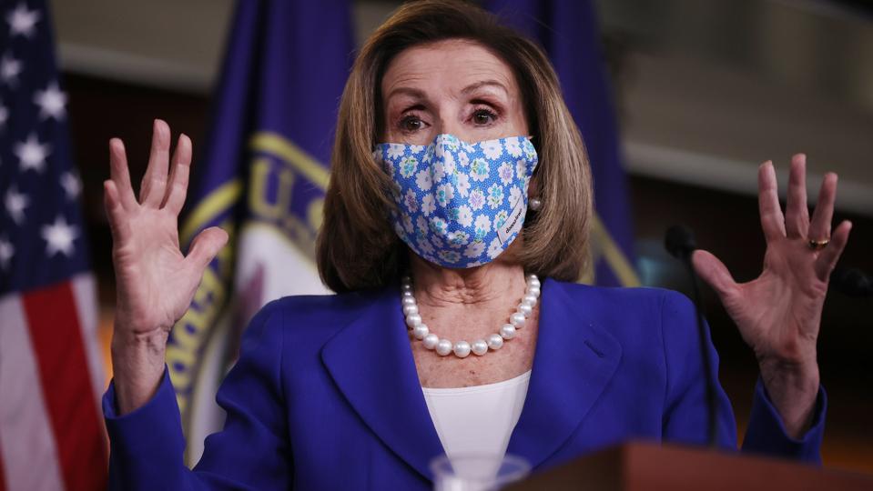 Speaker Pelosi Holds Weekly Press Briefing On Capitol Hill