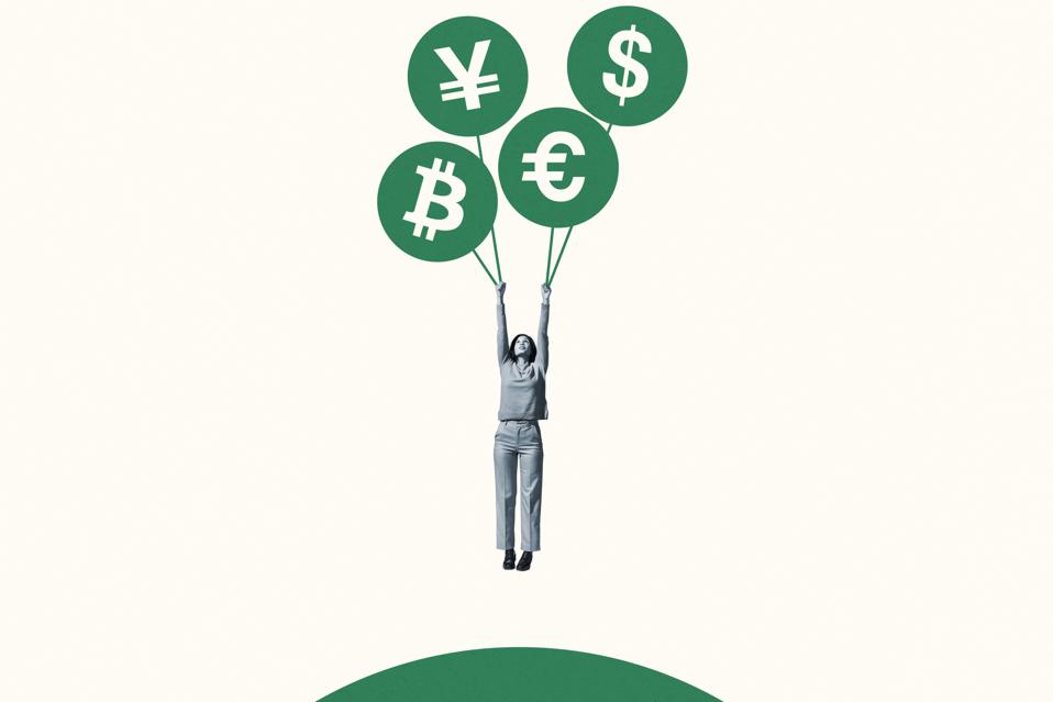 Woman hanging from green currency symbol balloons