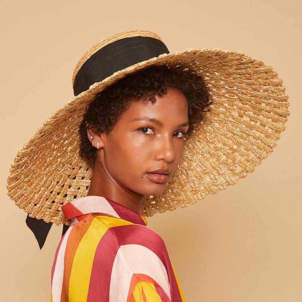 Mirabel woven hat with black trim by EUGENIA KIM