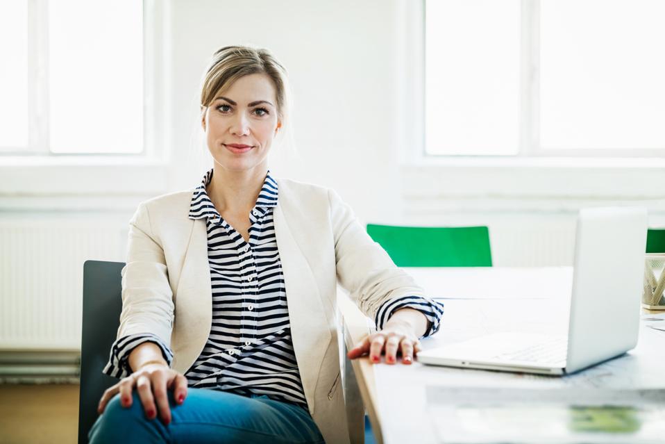 The Power Of Branding In 2021 2 Portrait Of Business Owner At Conference Table