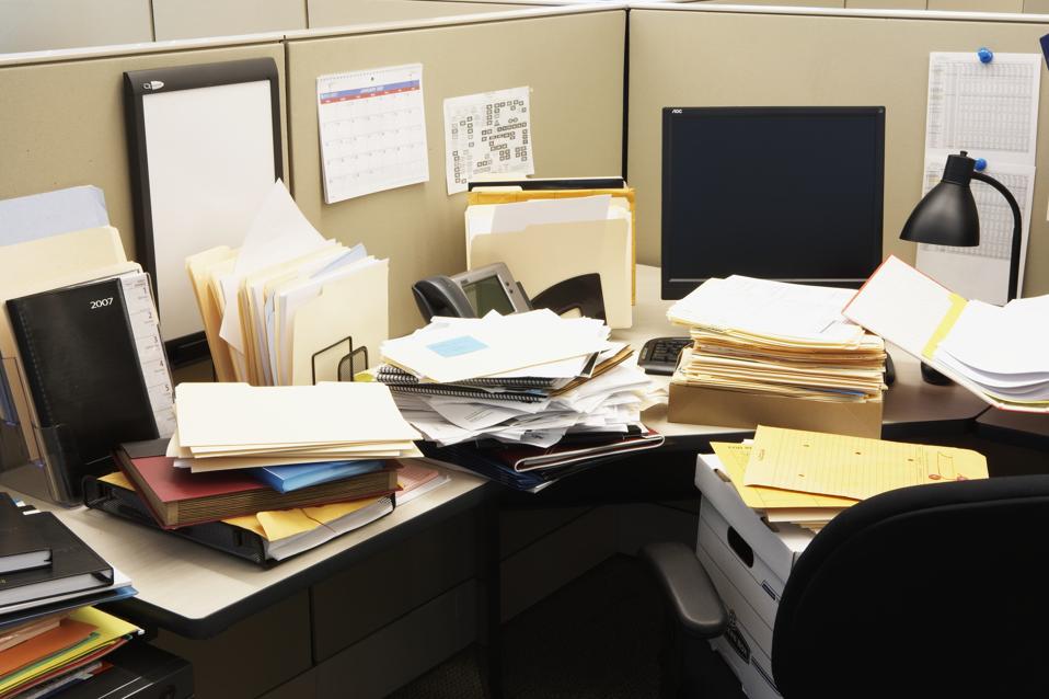 We Need To Talk About The Messy Middle Of Customer Experience 2 Files and computer in office