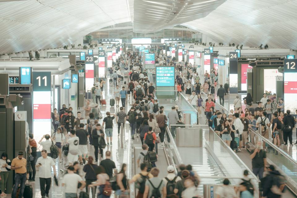 Crowd commuters of pedestrian commuters in airport terminal