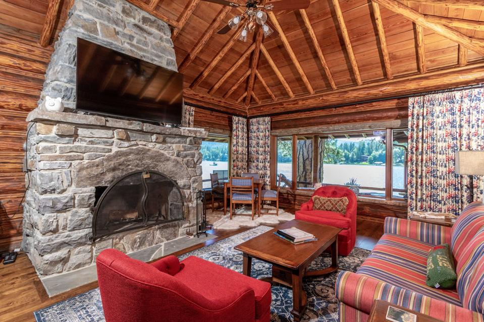 living room inside copper king log cabin lodge 13592 River Run Loop Bigfork, Montana, USA