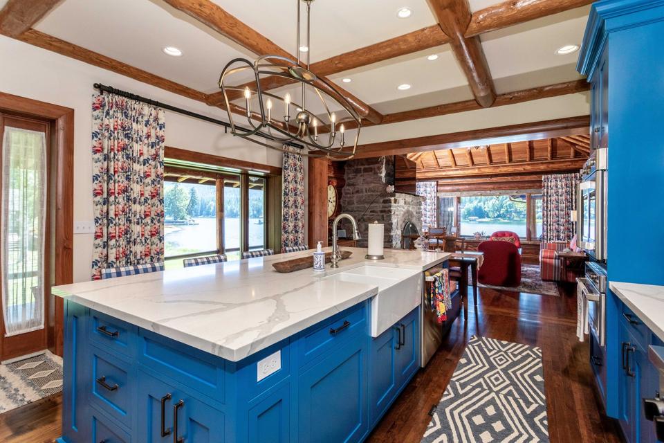 kitchen and living room inside log cabin cornelius kelley swan lake copper king 13592