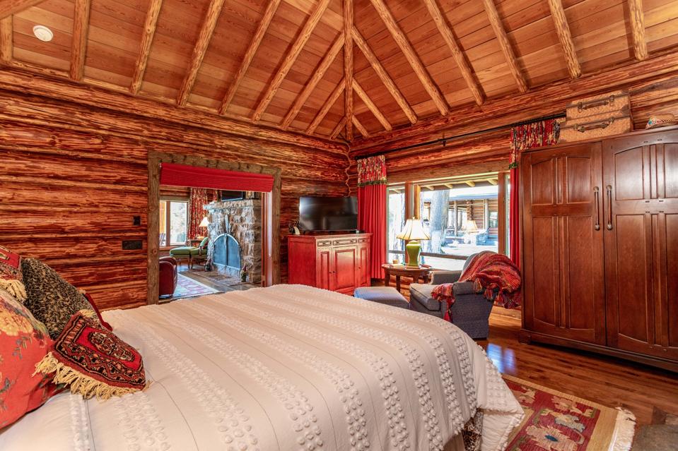 bedroom inside swan lake log home 13592 River Run Loop Bigfork, Montana, USA