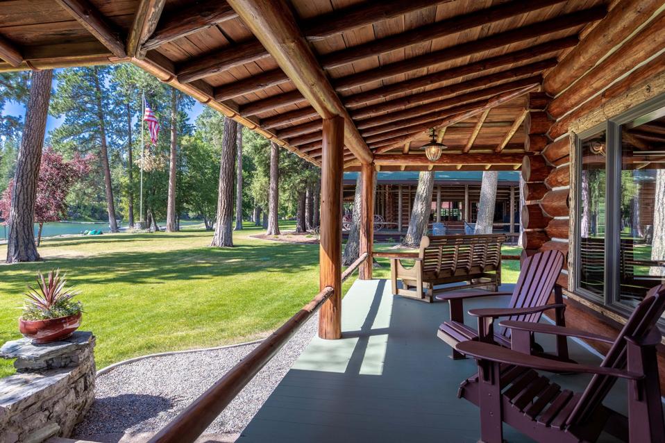 swan lake log home wraparound balcony 13592 River Run Loop Bigfork, Montana, USA