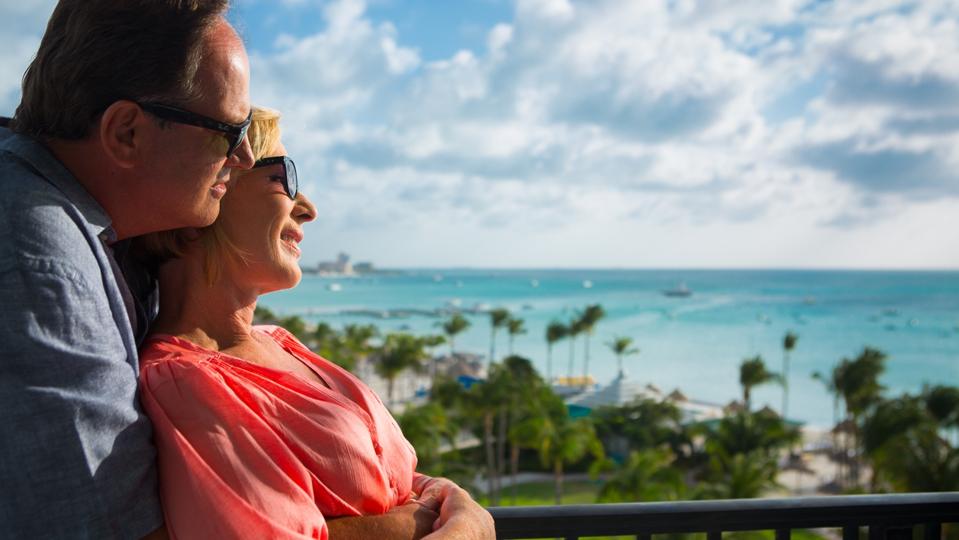 The guests holding each other at a hotel in Aruba.