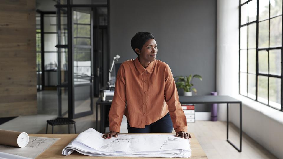 Entrepreneur looking away at workplace