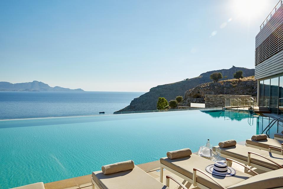 The pool at Lindos Blu hotel on Rhodes, Greece, has great views over the Mediterranean Sea