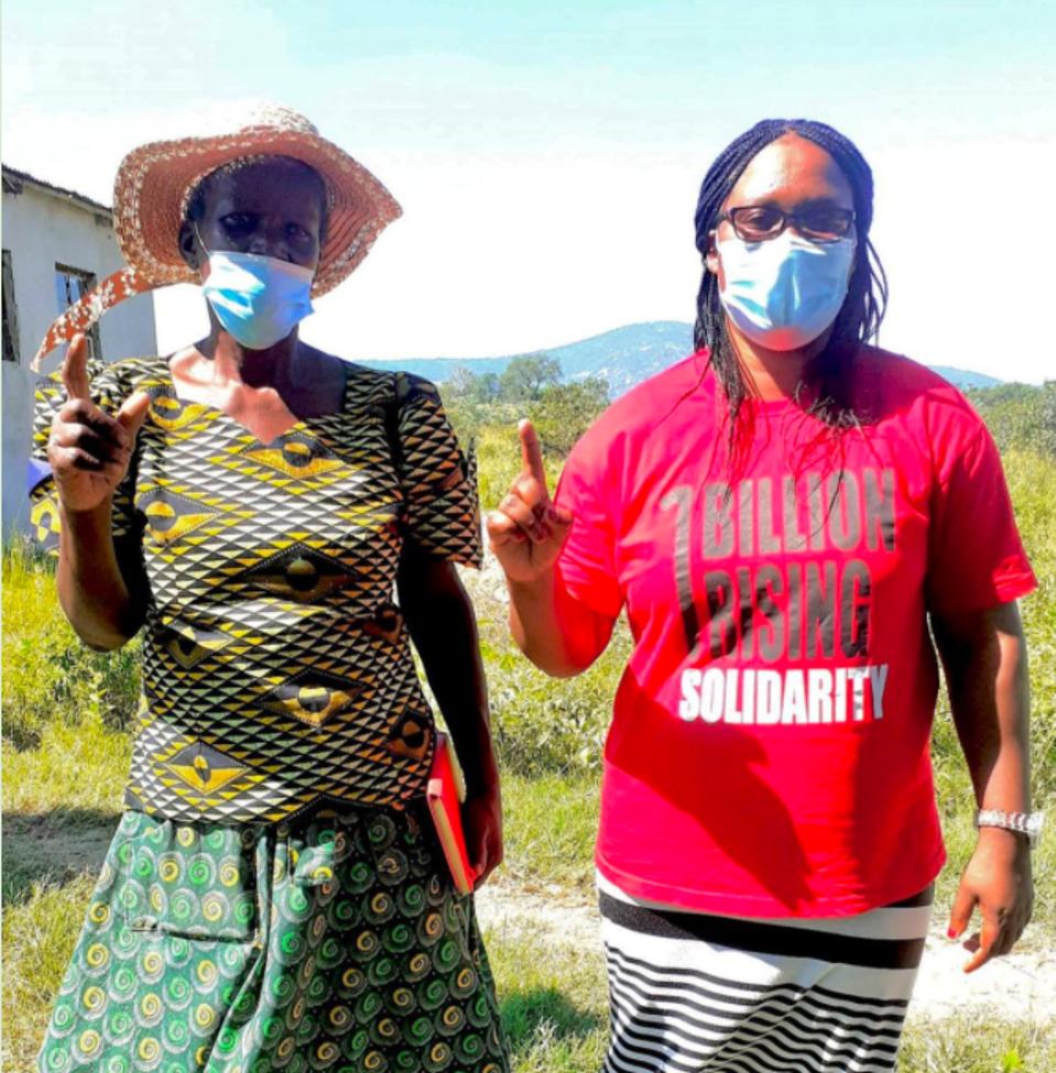 Colani Hlatjwako, One Billion Rising Africa Coordinator, with one of the community volunteers, Make Thokozani Mbatha.