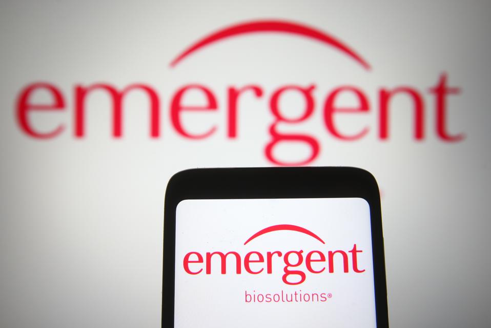 In this photo illustration the Emergent BioSolutions logo of...
