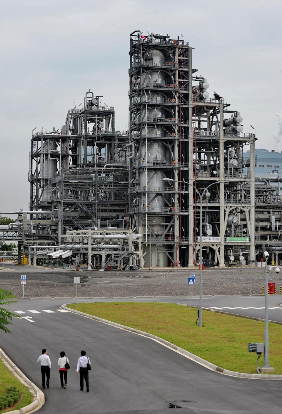 Visitors walk towards the Neste Oil NExt