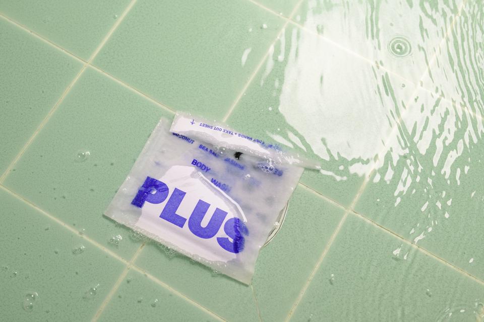 Plus body wash sachet in shower drain