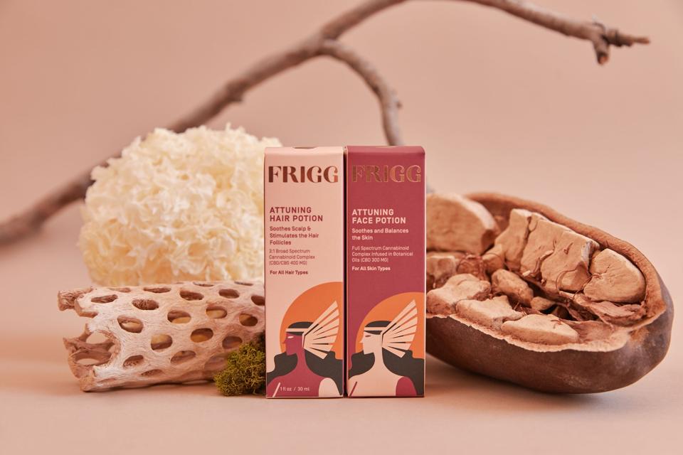 The Frigg Attuning Combo Pack for hair and face stylized with botanic props.