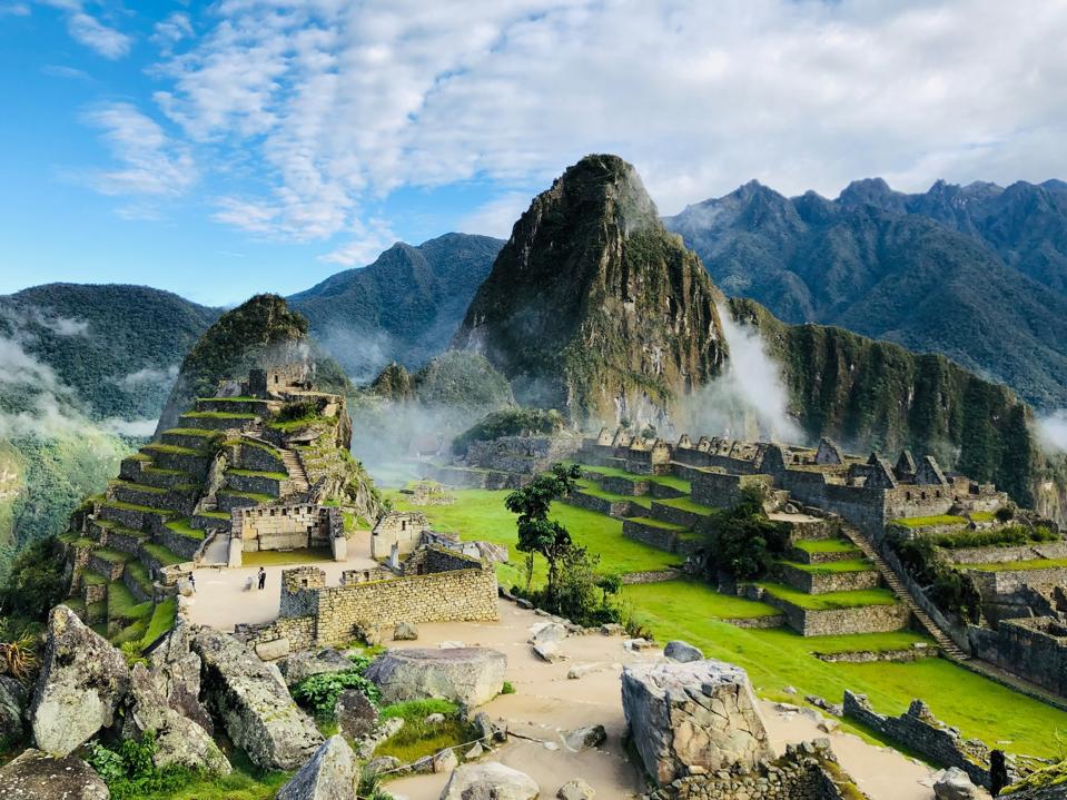 Machu Pichu and Huayna Picchu in the morning clouds