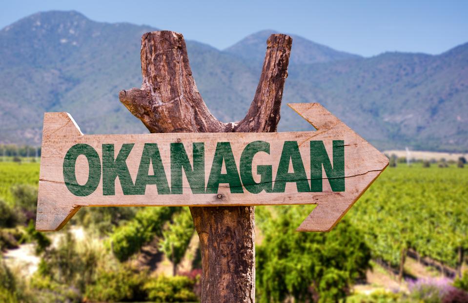 Okanagan sign with winery background