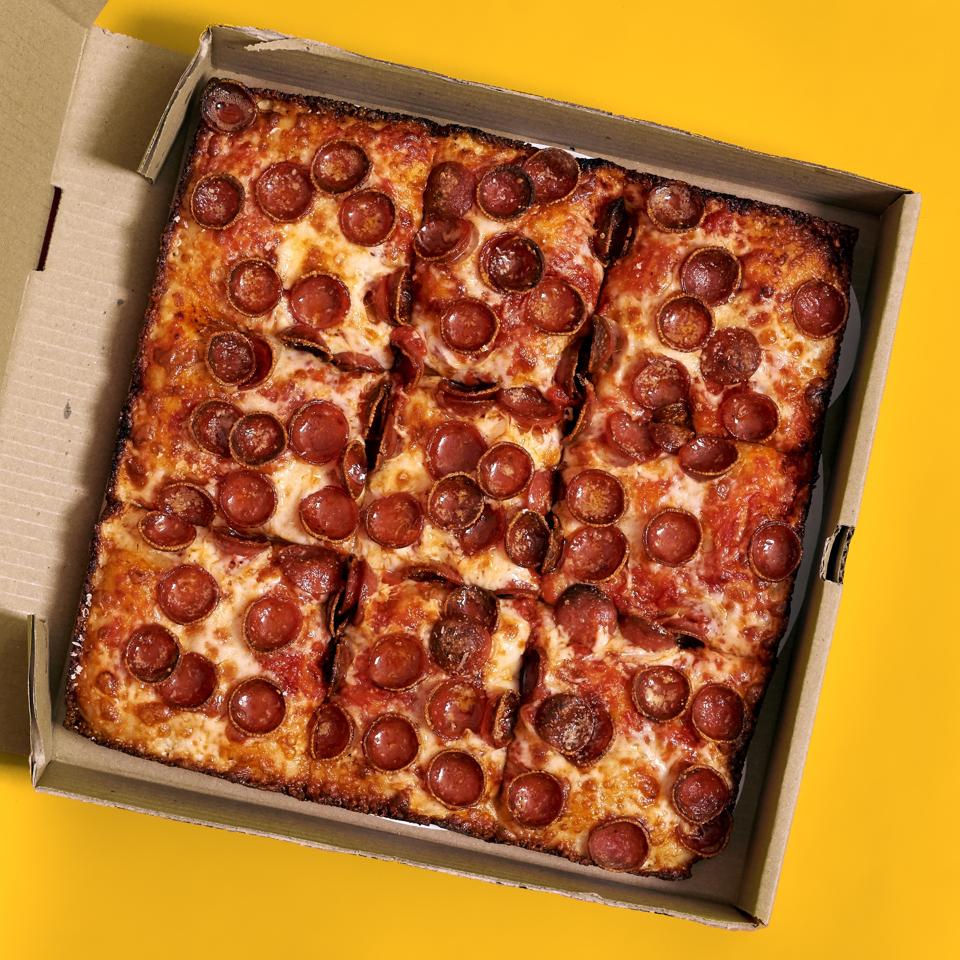 Sicilian pepperoni pizza in a pizza box