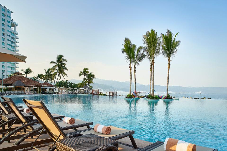 Palm trees by the poo at Marriott Puerto Vallarta Resort & Spa.