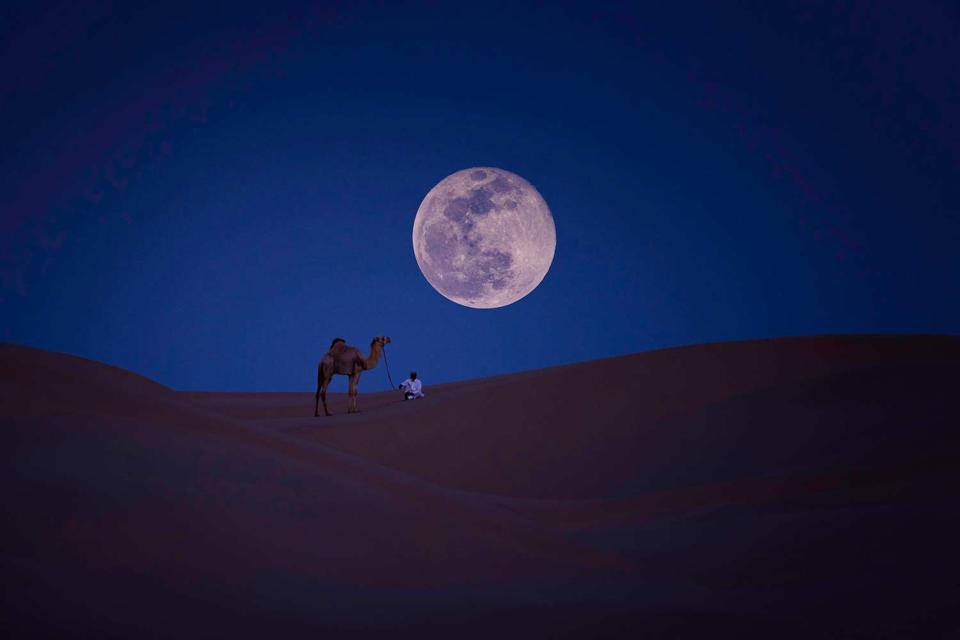 Qatar National Tourism Council (QNTC) has captured the incredible Pink Supermoon above the Torch Tower in Doha and in the Al Aamriya Desert. Partnering with local astro-photographer Vinay Swaroop Balla, the striking images show the moon rising above the country’s iconic locations.