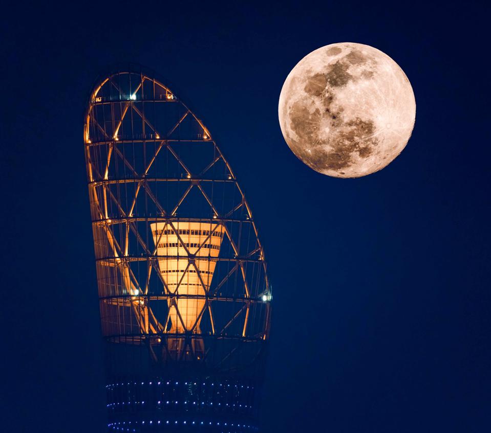 Qatar National Tourism Council (QNTC) has captured the incredible Pink Supermoon above the Torch Tower in Doha and in the Al Aamriya Desert. Partnering with local astro-photographer Vinay Swaroop Balla, the striking images show the moon rising above the country’s iconic locations.