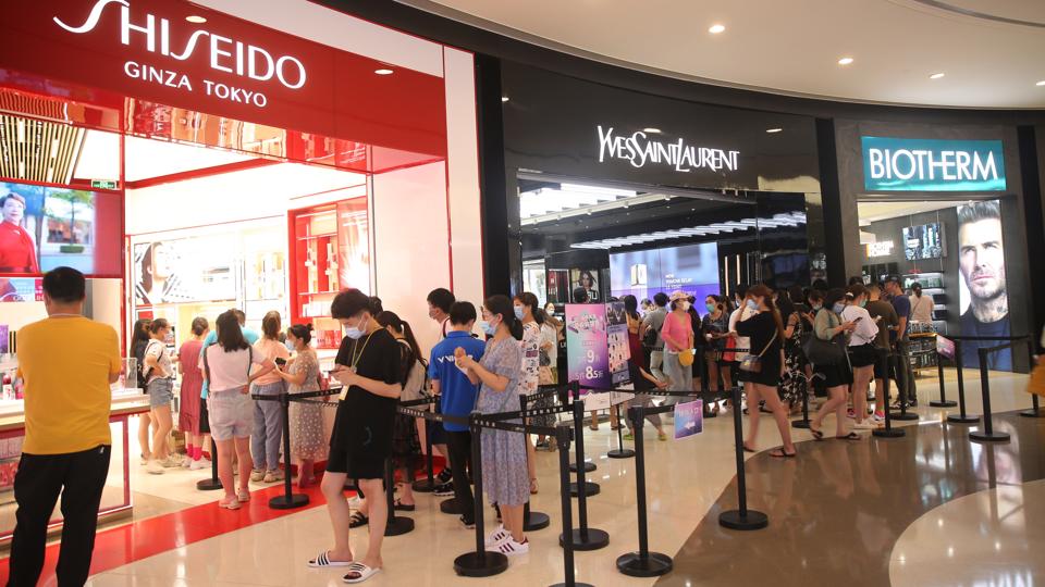 Shoppers line up in SANYA DUTY-FREE SHOPPING mall, Hainan.