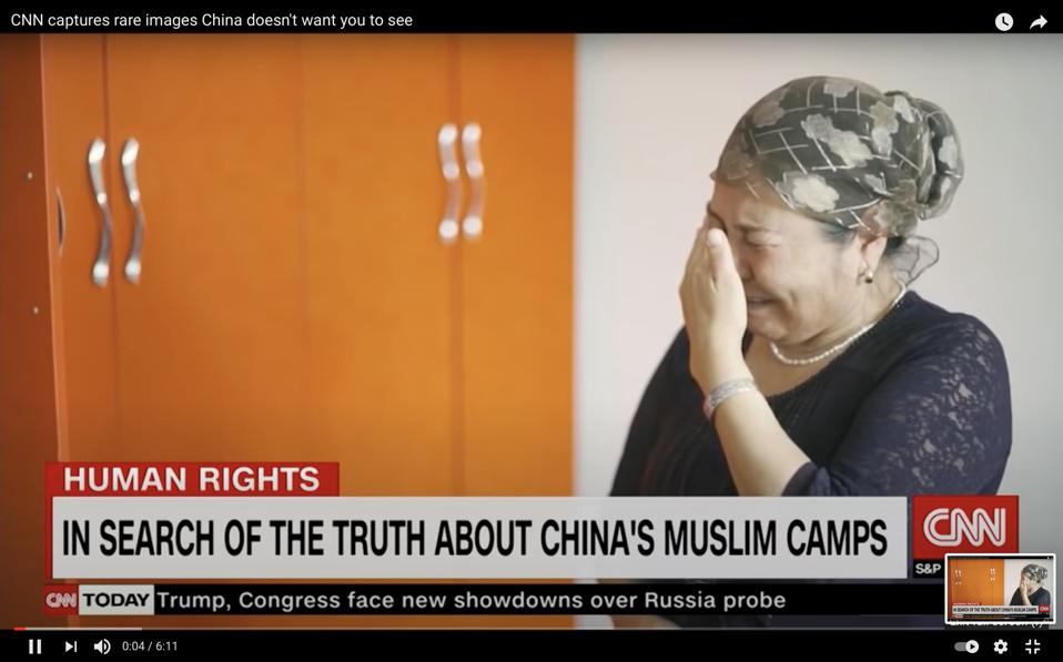 Crying Uyghur mother