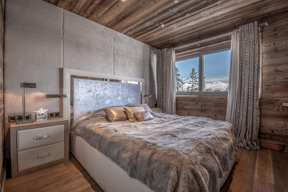 bedroom inside Superb Chalet ideally located in the heart of Courchevel 1850