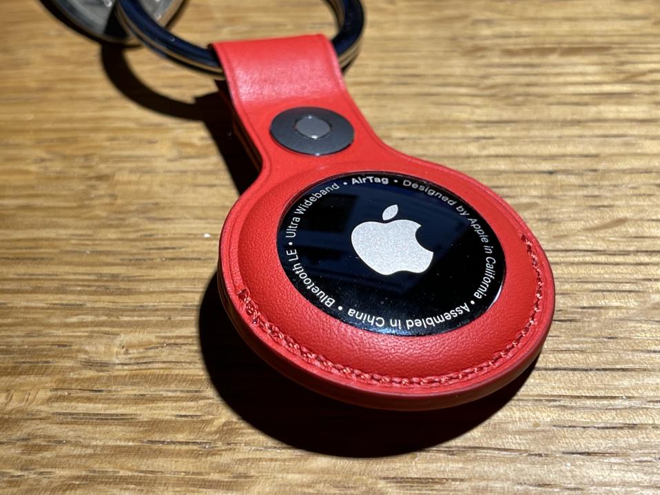 Apple AirTag in leather key ring accessory.