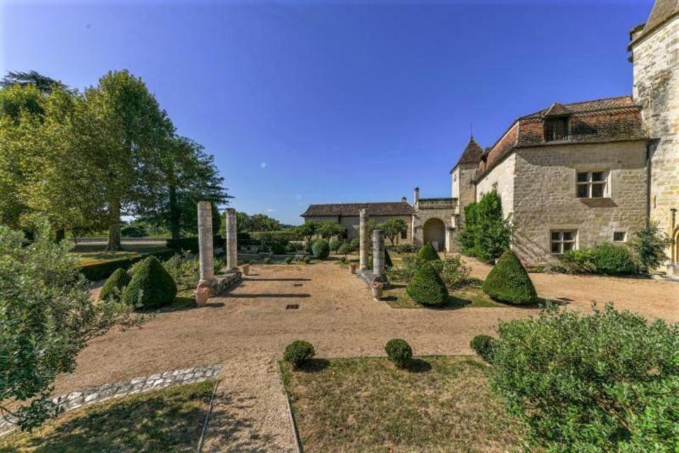 gardens and statuaries at french chateau medieval castle Perigueux, Dordogne, France