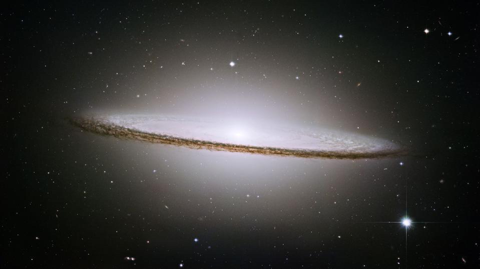 The Sombrero Galaxy, Messier 104, has a large central bulge but also a prominent disk.